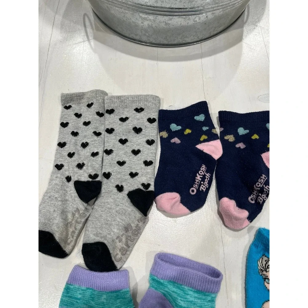 Lot of 7 pairs of socks including Disney size 2-4 yrs‎